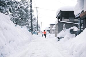 shoveling snow in winter